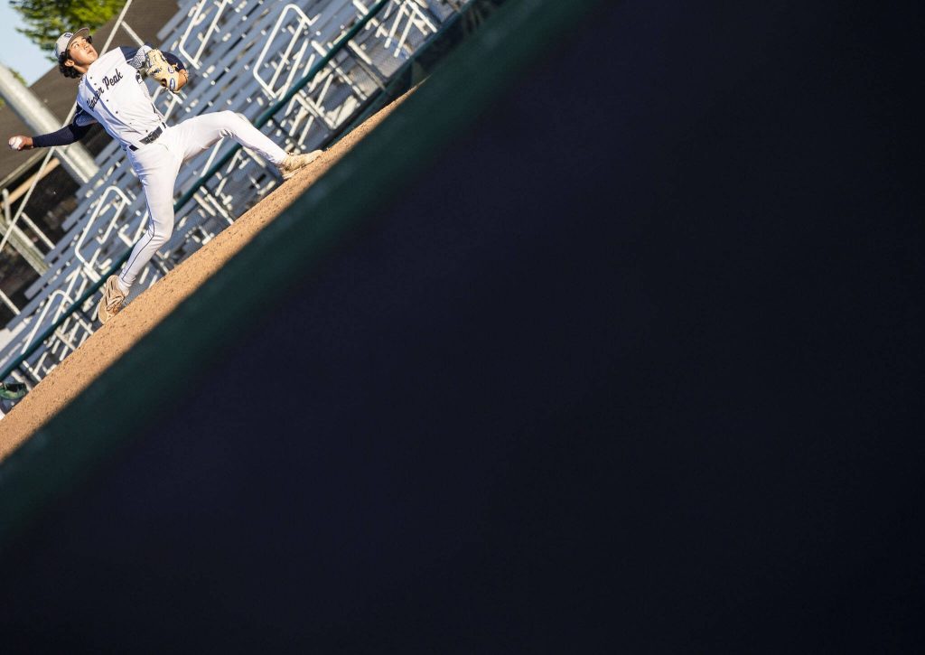 Glacier Peaks Khristian Prom throws a pitch during the 4A district game against Bothell at Funko Field on Thursday, May 9, 2024 in Everett, Washington. (Olivia Vanni / The Herald)