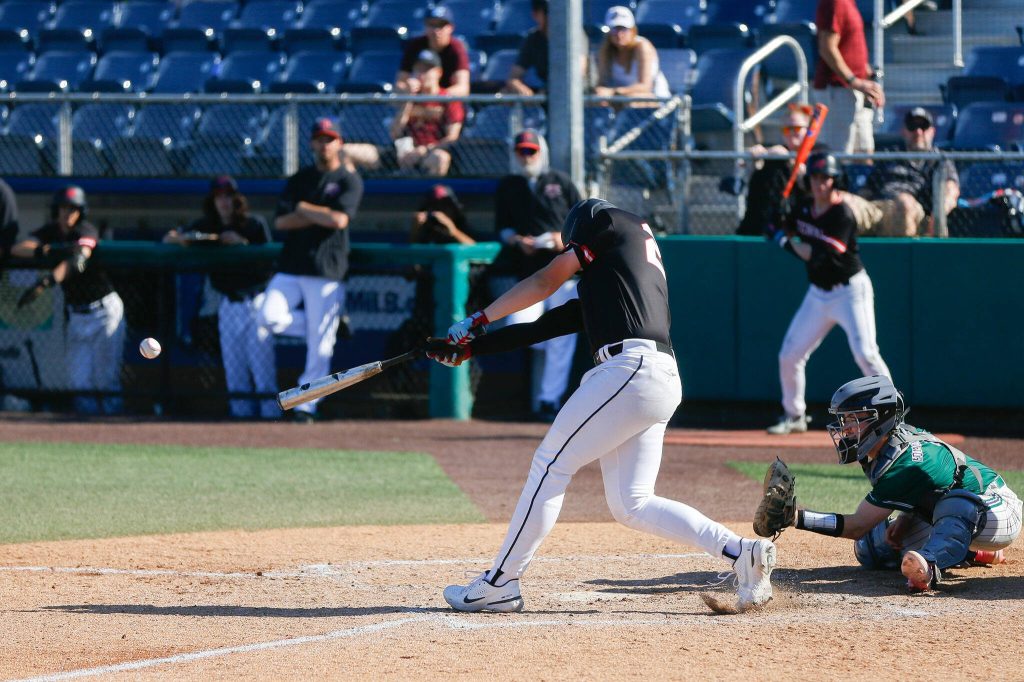 Mountlake Terrace sophomore Jack Gripentrog notches a pair of RBIs against Edmonds-Woodway in the Class 3A District 1 baseball championship Saturday, May 11, 2024, at Funko Field in Everett, Washington. (Ryan Berry / The Herald)