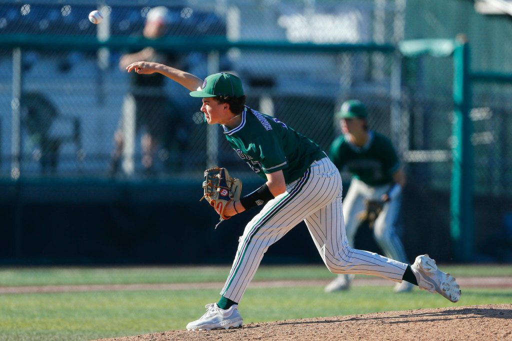 Edmonds-Woodways Finn Crawford pitches in relief against Mountlake Terrace in the Class 3A District 1 baseball championship Saturday, May 11, 2024, at Funko Field in Everett, Washington. (Ryan Berry / The Herald)