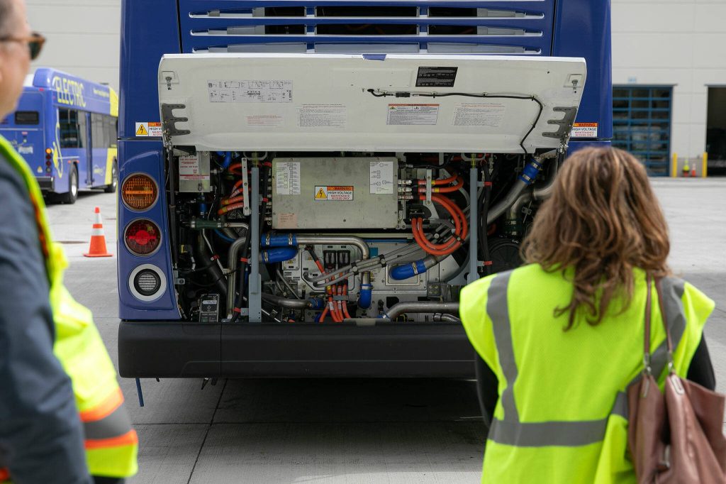 The hydrogen-powered guts of a new zero-emission Community Transit bus are seen under an open hood on Monday, May 13, 2024, at the Community Transit Operations Base in Everett, Washington. (Ryan Berry / The Herald)