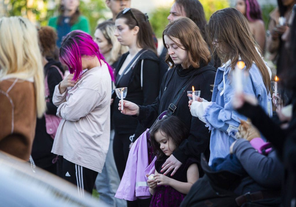 People take a moment of silence to remember Liliya Guyvoronsky during a vigil held on Tuesday, May 14, 2024 in Seattle, Washington. (Olivia Vanni / The Herald)