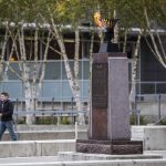 The Eternal Flame monument burns in the center of the Snohomish County Campus on Thursday, Nov. 3, 2022 in Everett, Washington. (Olivia Vanni / The Herald)
