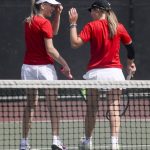 Snohomishs Mak Dauer, left, and Hannah Wells, right, celebrate during the Class 3A District 1 girls tennis tournament at Snohomish High School in Snohomish, Washington on Wednesday, May 15, 2024. (Annie Barker / The Herald)