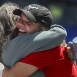 Snohomish's Hannah Wells, right, celebrates during a Class 3A District 1 girls tennis tournament at Snohomish High School in Snohomish, Washington on Wednesday, May 15, 2024. (Annie Barker / The Herald)