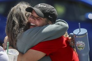 Snohomish's Hannah Wells, right, celebrates during a Class 3A District 1 girls tennis tournament at Snohomish High School in Snohomish, Washington on Wednesday, May 15, 2024. (Annie Barker / The Herald)
