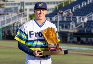 Everett AquaSox pitcher Tyler Cleveland is presented with his 2023 Rawlings Gold Glove Award prior to Everetts game against the Eugene Emeralds on Wednesday at Funko Field. (Photo courtesy of the Everett AquaSox)