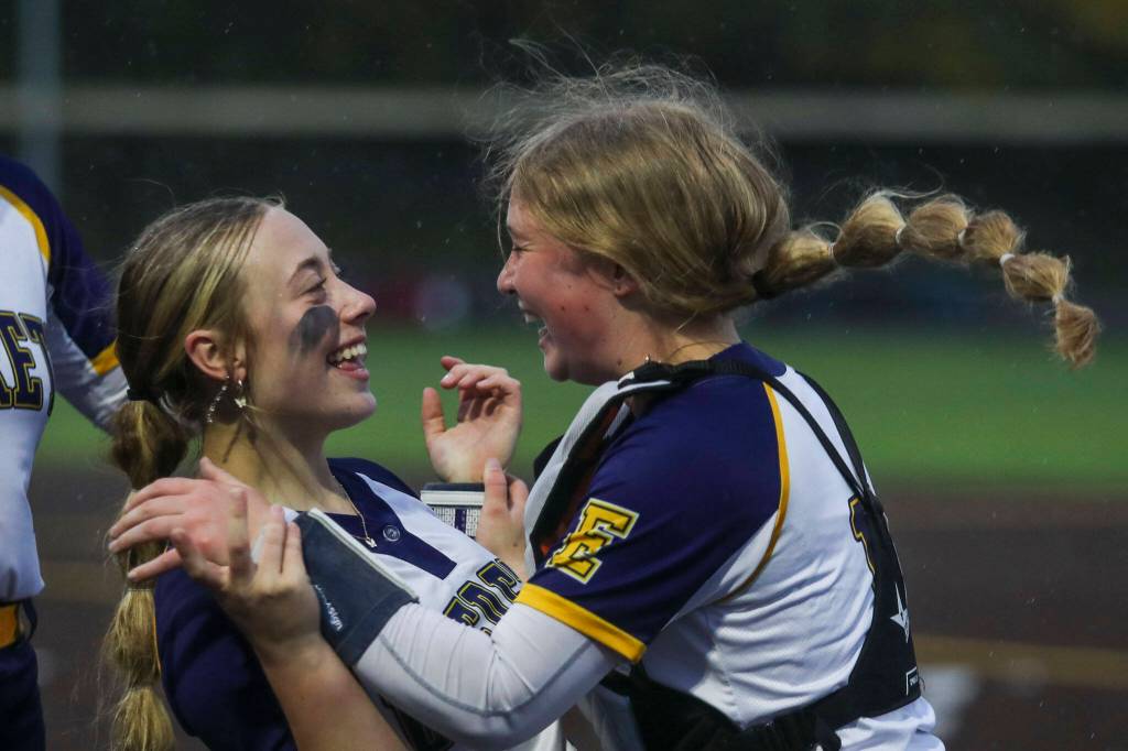 Everett players celebrate during a Class 3A District 1 softball championship game between Snohomish and Everett at Phil Johnson Fields in Everett, Washington on Thursday, May 16, 2024. Everett won, 10-0. (Annie Barker / The Herald)