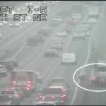 Two people fight on the side of I-5 neat Marysville. (Photo provided by WSDOT)