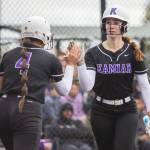 Kamiaks Aliana Boulger high-fives her teammate after scoring during the 4A district championship on Friday, May 17, 2024 in Everett, Washington. (Olivia Vanni / The Herald)