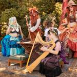 Whidbey Renaissance Faire volunteers pose in their costumes. (Photo by Bree Eaton)