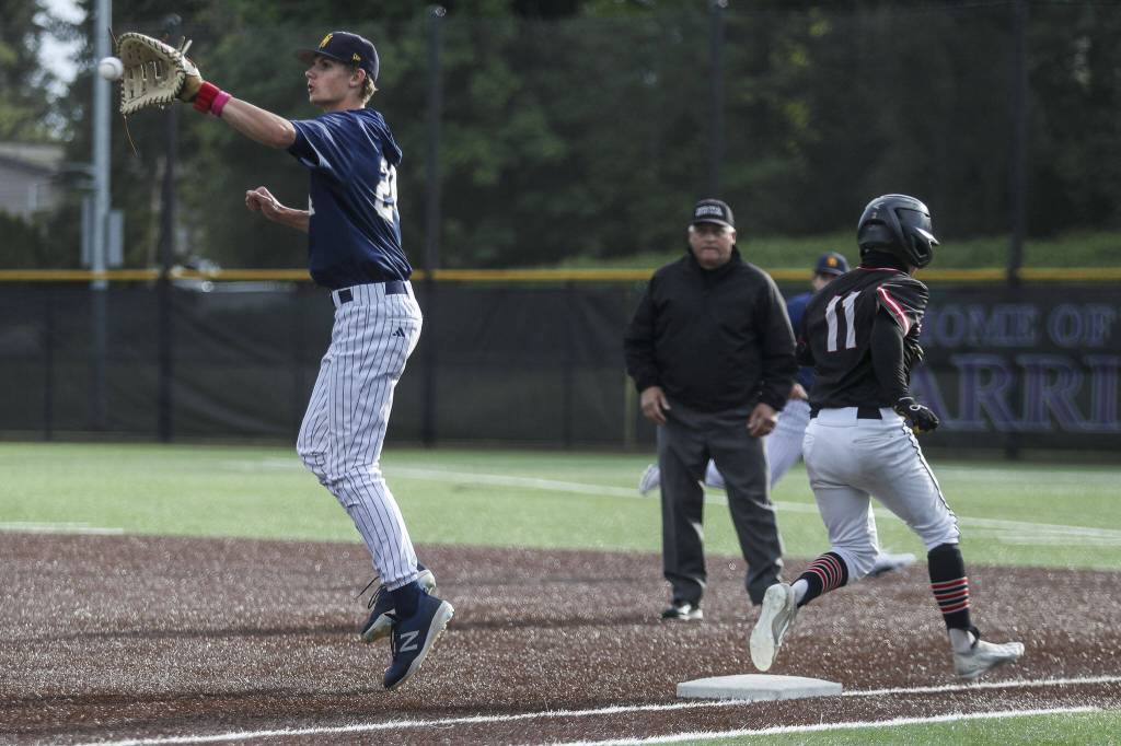Mountlake Terraces Griffin Potter (11) runs to first during a baseball game between Mountlake Terrace and West Seattle at Edmonds-Woodway High School in Edmonds, Washington on Saturday, May 18, 2024. Mountlake Terrace lost, 9-10.(Annie Barker / The Herald)