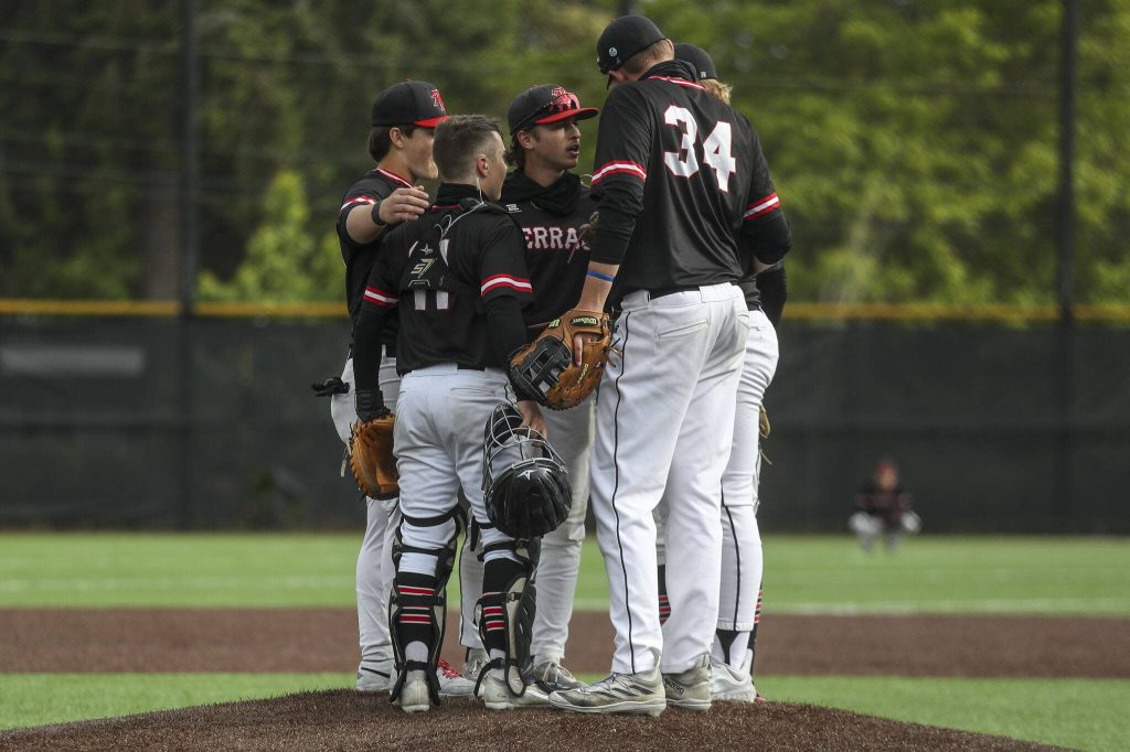 Mountlake Terrace players huddle during a baseball game between Mountlake Terrace and West Seattle at Edmonds-Woodway High School in Edmonds, Washington on Saturday, May 18, 2024. Mountlake Terrace lost, 9-10.(Annie Barker / The Herald)
