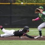 Mountlake Terraces Robert Swan (12) slides back to second during a baseball game between Mountlake Terrace and Bishop Blanchet at Edmonds-Woodway High School in Edmonds, Washington on Saturday, May 18, 2024. Mountlake Terrace won, 12-7.(Annie Barker / The Herald)