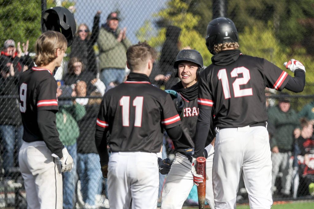 Mountlake Terrace players celebrate a home run during a baseball game between Mountlake Terrace and West Seattle at Edmonds-Woodway High School in Edmonds, Washington on Saturday, May 18, 2024. Mountlake Terrace lost, 9-10.(Annie Barker / The Herald)