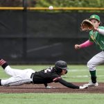 Mountlake Terraces Robert Swan (12) slides back to second during a baseball game between Mountlake Terrace and Bishop Blanchet and at Edmonds-Woodway High School in Edmonds, Washington on Saturday, May 18, 2024. Mountlake Terrace won, 12-7.(Annie Barker / The Herald)