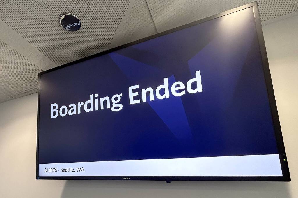A sign reads "Boarding Ended" at Gate M-9 in Terminal 5 of O'Hare International Airport on Tuesday, May 21, 2024. (Jordan Hansen/The Herald)