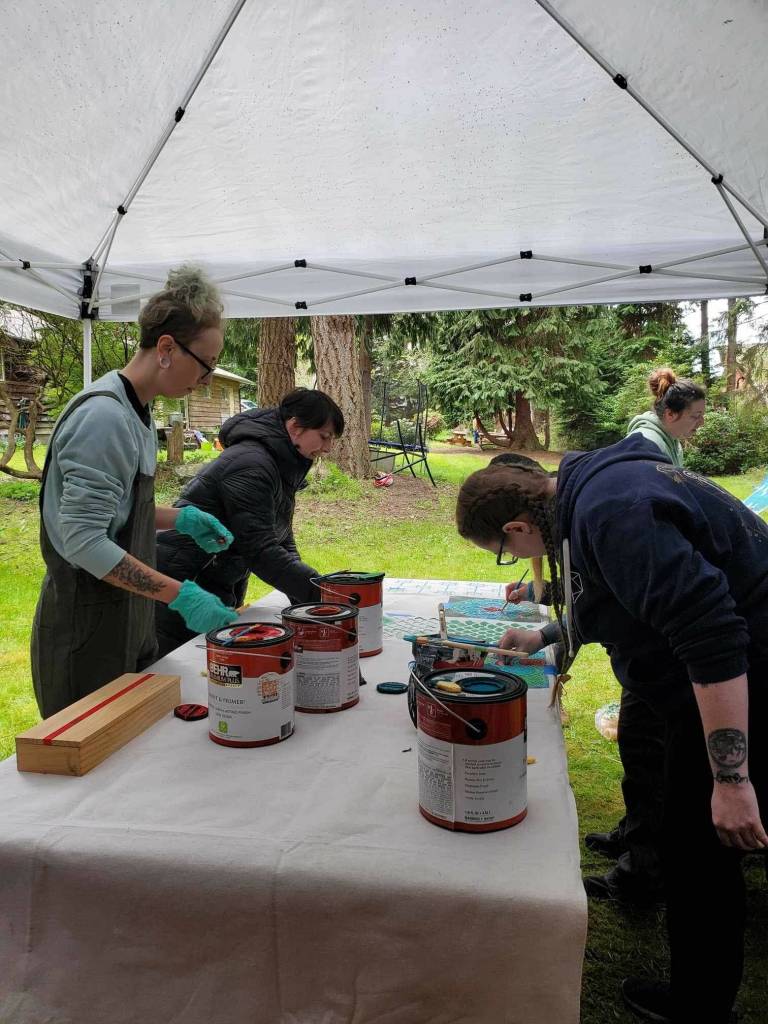 Whidbey Renaissance Faire volunteers work on the set. (Photo provided)