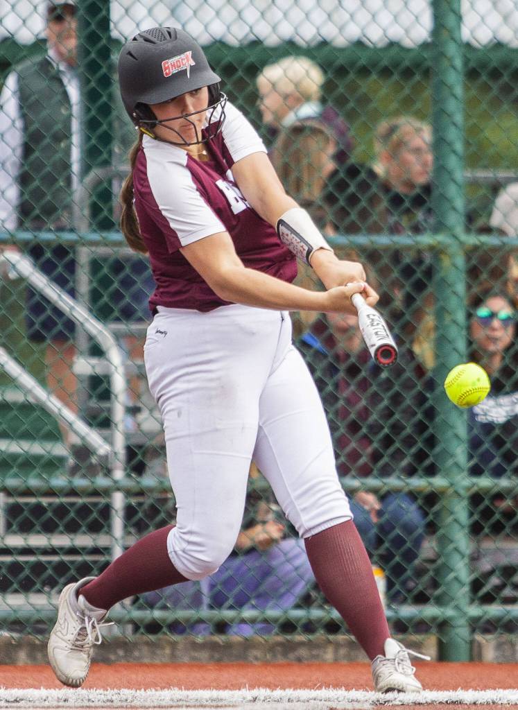 Cascades Mia Walker gets a hit during the 3A state softball tournament game against Gig Harbor on Thursday, May 23, 2024 in Lacey, Washington. (Olivia Vanni / The Herald)