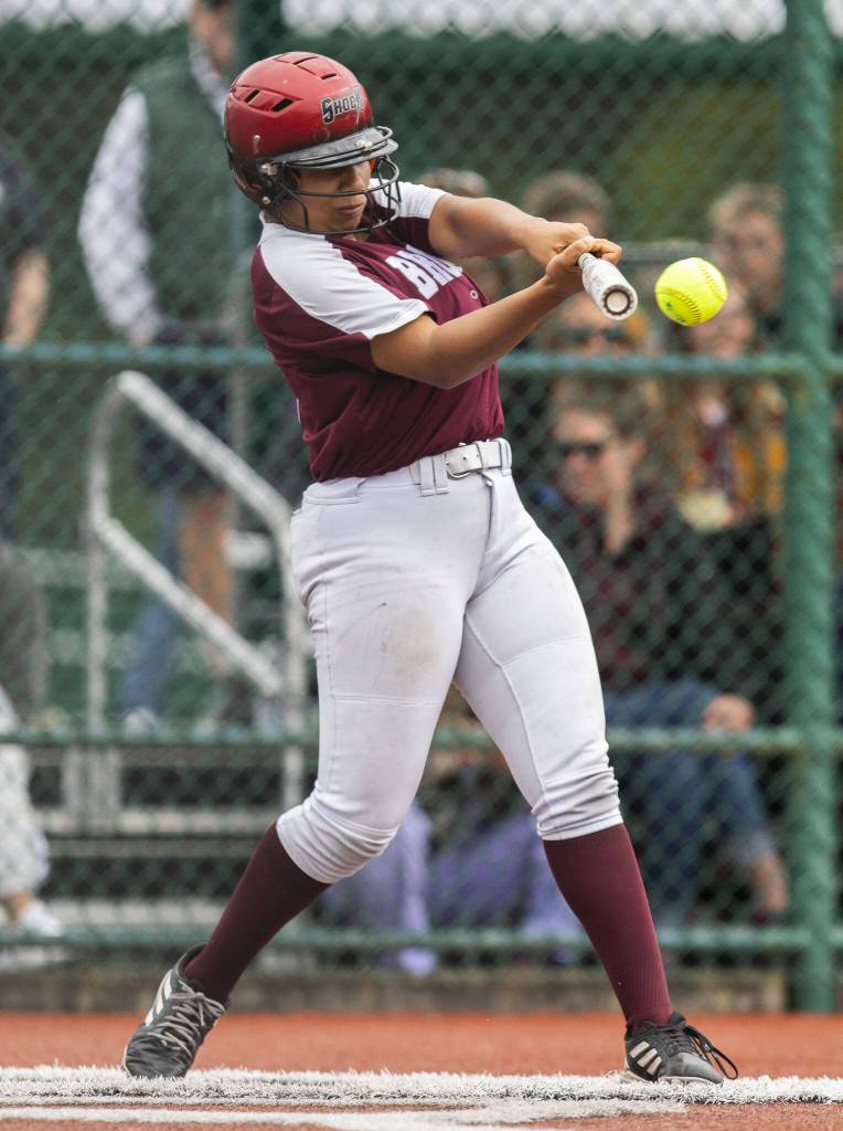 Cascades Jaidyn Wilson hits a grand slam during the 3A state softball tournament game against Gig Harbor on Thursday, May 23, 2024 in Lacey, Washington. (Olivia Vanni / The Herald)