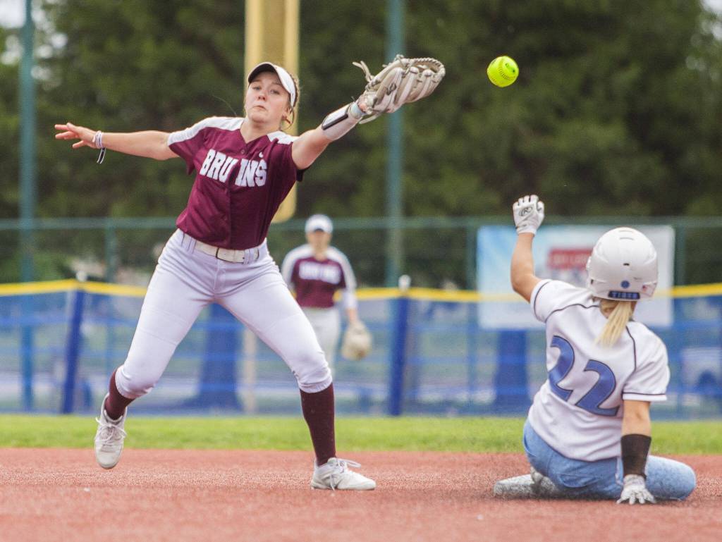 The ball skips out of the glove of Cascades Tessa Hahn during the 3A state softball tournament game against Gig Harbor on Thursday, May 23, 2024 in Lacey, Washington. (Olivia Vanni / The Herald)