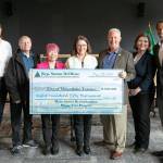 Rep. Suzan DelBene, center, presents a check worth $850,000 to the city of Mountlake Terrace as part of its Main Street Revitalization project on Tuesday, May 28, 2024, a the citys council chambers in Mountlake Terrace, Washington. (Ryan Berry / The Herald)