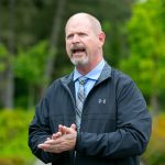 City Manager Jeff Niten speaks to a group during a tour and discussion with community leaders regarding the Mountlake Terrace Main Street Revitalization project on Tuesday, May 28, 2024, in Mountlake Terrace, Washington. (Ryan Berry / The Herald)