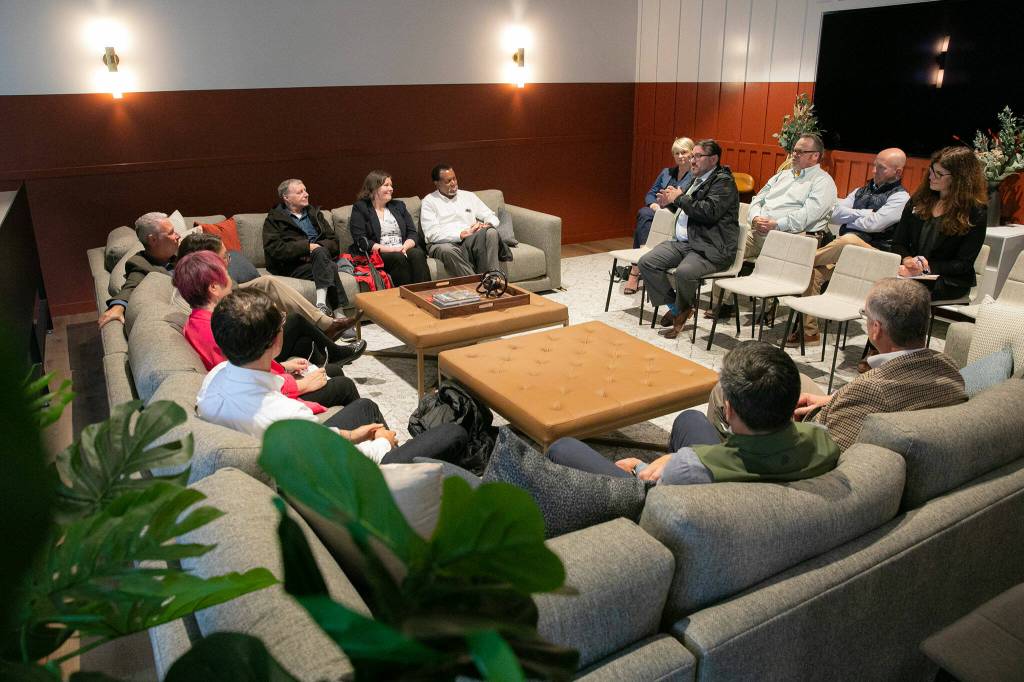 Rep. Suzan DelBene, mayor Kyoko Matsumoto-Wright and other community leaders gather for a discussion regarding the Mountlake Terrace Main Street Revitalization project on Tuesday, May 28, 2024, at the Traxx Apartments in Mountlake Terrace, Washington. (Ryan Berry / The Herald)