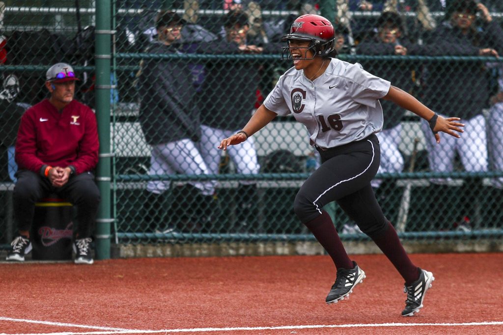 Cascades Jaidyn Wilson (16) celebrates a home run during a 3A softball game between Cascade and University at the regional athletic complex in Lacey, Washington on Friday, May 24, 2024. Cascade fell, 6-7. (Annie Barker / The Herald)