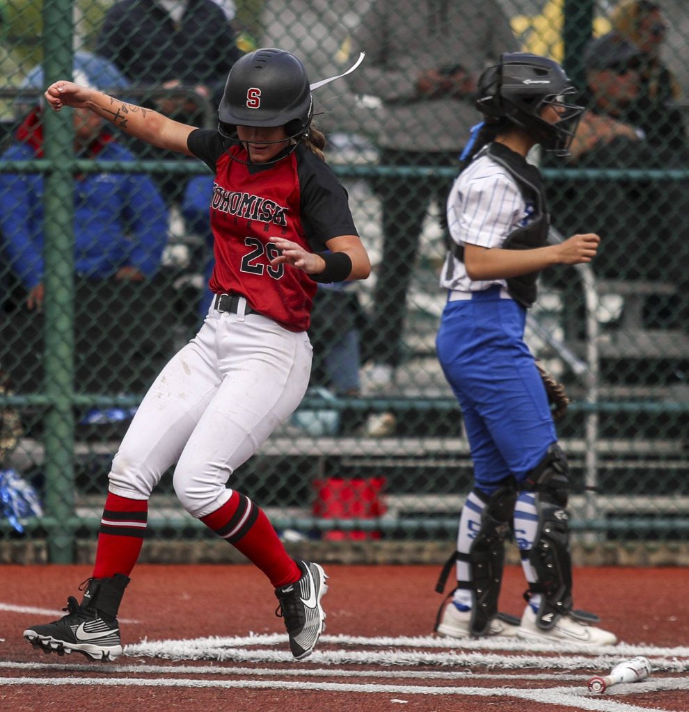 Snohomishs Zoey Lynch (29) scores during a 3A softball game between Snohomish and Seattle Prep at the regional athletic complex in Lacey, Washington on Friday, May 24, 2024. Snohomish won, 8-0. (Annie Barker / The Herald)
