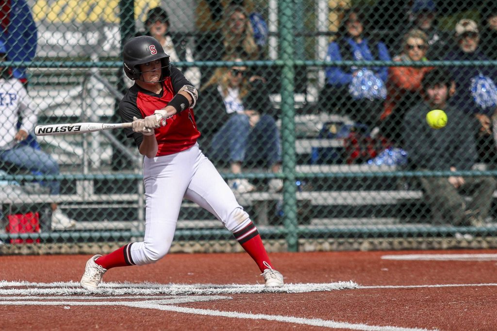 Snohomishs Camryn Sage (15) swings during a 3A softball game between Snohomish and Seattle Prep at the regional athletic complex in Lacey, Washington on Friday, May 24, 2024. Snohomish won, 8-0. (Annie Barker / The Herald)