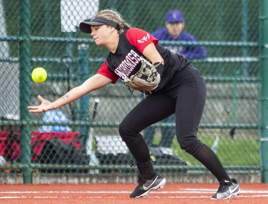 A Snohomish player bobbles the ball during the 3A state softball semifinal game against Garfield on Saturday, May 25, 2024 in Lacey, Washington. (Olivia Vanni / The Herald)
