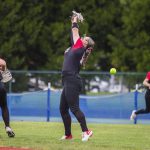 Snohomishs Emery Post misses a catch in the outfield during the 3A state softball semifinal game against Garfield on Saturday, May 25, 2024 in Lacey, Washington. (Olivia Vanni / The Herald)