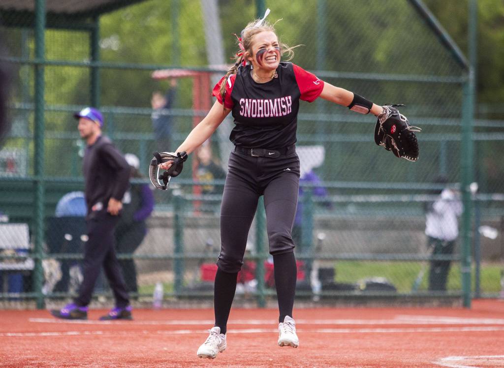 Snohomishs Alexandra Flohr celebrates getting the final strike to end the game to beat Garfield during the 3A state softball semifinal on Saturday, May 25, 2024 in Lacey, Washington. (Olivia Vanni / The Herald)
