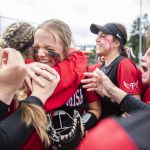 Snohomish players celebrate beating Garfield in the 3A state softball semifinal game to advance to the championship on Saturday, May 25, 2024 in Lacey, Washington. (Olivia Vanni / The Herald)