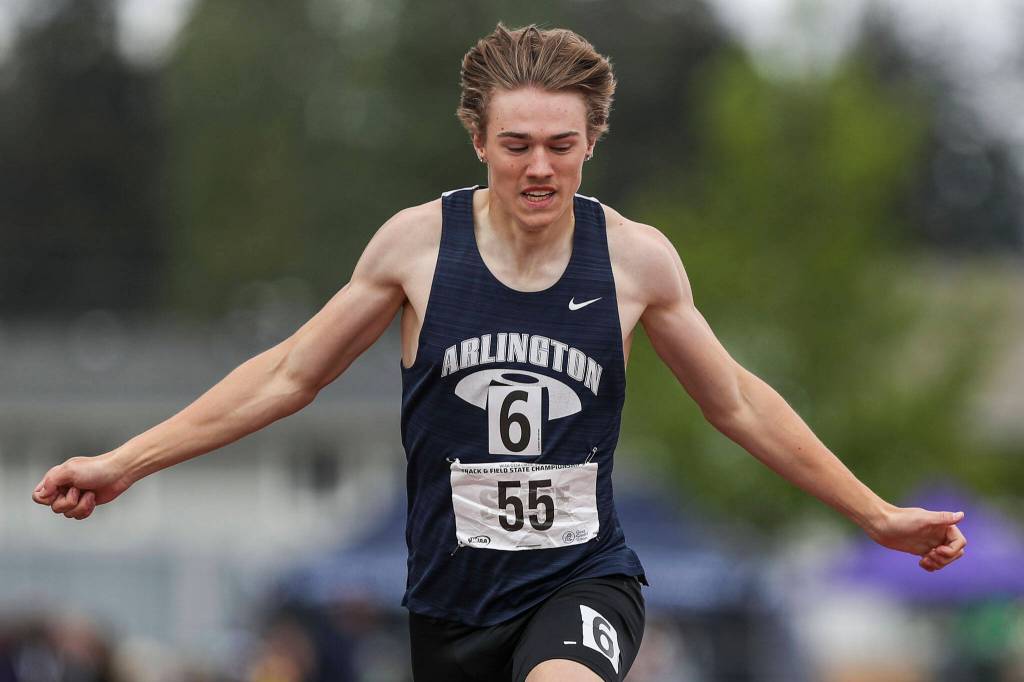 Arlingtons Dallas Miller participates in the Boys 400M 3A dash during the Class 4A, 3A, 2A track and field state championships at Mount Tahoma High School in Tacoma, Washington on Saturday, May 25, 2024. (Annie Barker / The Herald)