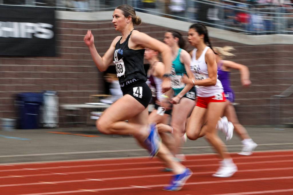 Runners participate in the Girls 100M dash during the Class 4A, 3A, 2A track and field state championships at Mount Tahoma High School in Tacoma, Washington on Saturday, May 25, 2024. (Annie Barker / The Herald)