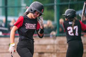Snohomish’s Hannah Siegler becomes emotional after striking out in the final inning of the 3A state softball championship game against Auburn Riverside on Saturday, May 25, 2024 in Lacey, Washington. (Olivia Vanni / The Herald)