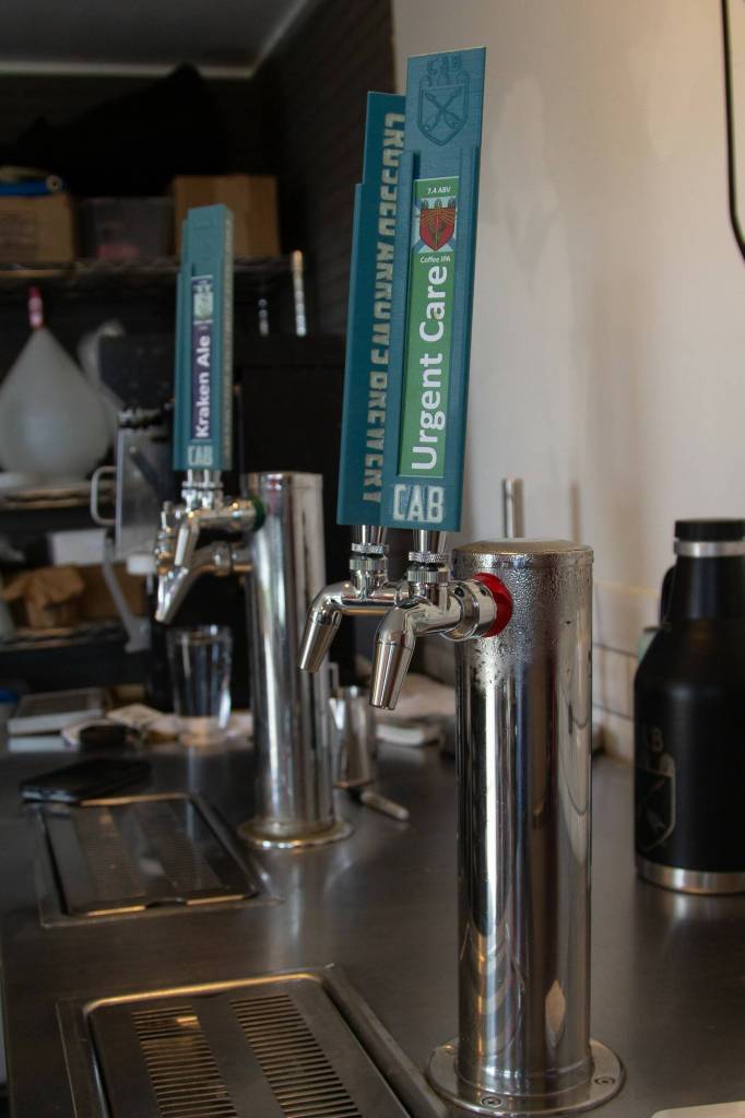 Beer taps inside Crossed Arrows Brewery are curated by Stephen Chavez in Oak Harbor. (Photo by Caitlyn Anderson)