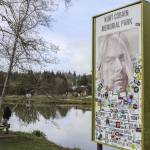 A sign with a portrait of Kurt Cobain at the Kurt Cobain Memorial Park on March 13 in Aberdeen, Washington. The park, located on the muddy shores of Wishkah River where the Nirvana frontman would hang out, includes several tributes to his memory and attracts visitors from around the world. (Brenda Mann Harrison / Special to The Herald)