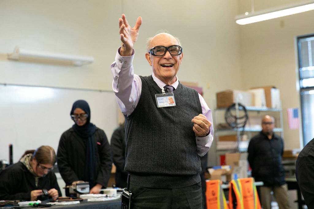 Sno-Isle TECH instructor Ted Rodriquez speaks to a gathering of people during a fiber optic technician training demonstration at Sno-Isle TECH Skills Center on Tuesday, May 28, 2024, in Everett, Washington. (Ryan Berry / The Herald)