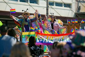 A float full of people dressed as butterflies crawls past hundreds celebrating on First Street during Snohomishs inaugural Pride celebration on Saturday, June 3, 2023, in downtown Snohomish, Washington. (Ryan Berry / The Herald)