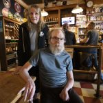 Freds Rivertown Alehouse owners Mark Chewey and Ginger Nuss at the staff table inside the pub on Tuesday, June 4, 2024 in Snohomish, Washington. (Olivia Vanni / The Herald)