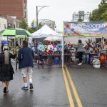 Rain begins to fall during the first day of Sorticulture on Friday, June 9, 2023 in Everett, Washington. (Olivia Vanni / The Herald)