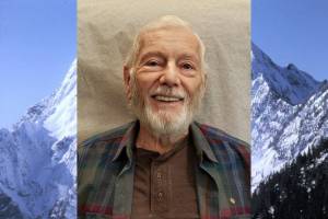 Kenn Carpenter at age 95 on Feb. 10, 2024, with his photo of Big Four behind him. (Submitted photos)