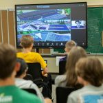 Maplewood Parent Cooperative School seventh and eighth grade students listen to Mason Rolph of Olympia Community Solar speak about different solar projects during a science class for the student's Sustainable Schools engineering units on Friday, June 7, 2024 in Edmonds, Washington. (Olivia Vanni / The Herald)