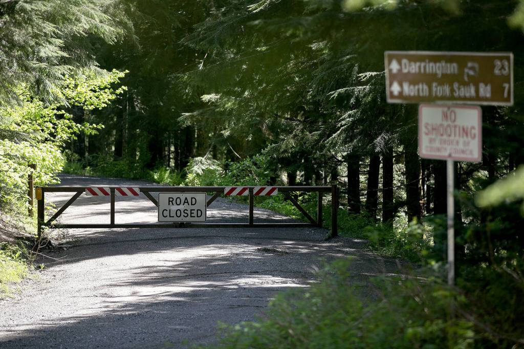 The gate at Barlow Pass Trailhead on Mountain Loop Highway remains closed due to wet conditions on Thursday, June 6, 2024, in rural Snohomish County, Washington. (Ryan Berry / The Herald)