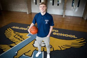 Drew Bryson, the new Arlington boys basketball head coach, at Arlington High School on Tuesday, June 11, 2024. (Olivia Vanni / The Herald)