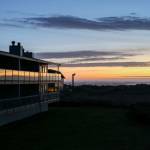 The decks at Hi-Tide Ocean Beach Resort reflect the evenings sun set colors on March 13 in Moclips, Washington. (Brenda Mann Harrison / Special to The Herald)