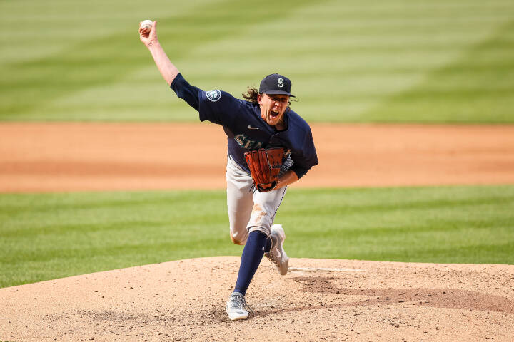 Pitcher Logan Gilbert (36) pitches against the Washington Nationals on May 25 at Nationals Park in Washington, DC. (Scott Taetsch / Getty Images, file)