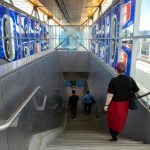 Mountlake Terrace Mayor Kyoko Matsumoto Wright walks down the stairs from the platform following a press event at the Lynnwood City Center Link Station on Friday, June 7, 2024, in Lynnwood, Washington. (Ryan Berry / The Herald)